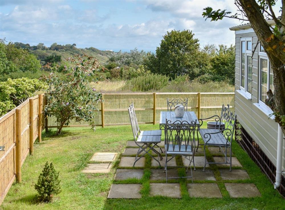 Patio area at Culver Chalet in Bembridge, near Sandown, Isle of Wight