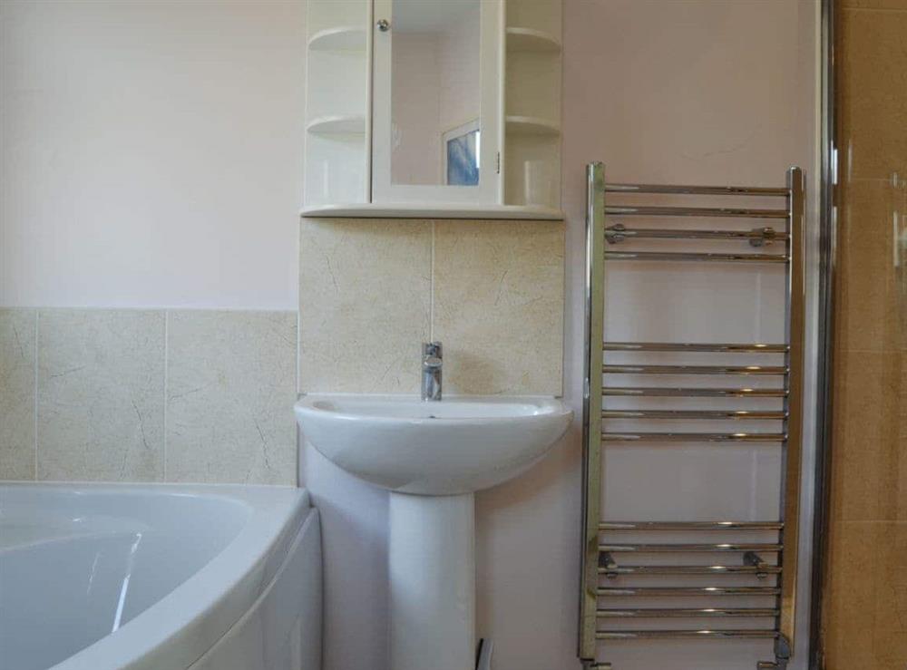 Bathroom with corner bath (photo 2) at Culver Cottage in Sandown, Isle Of Wight