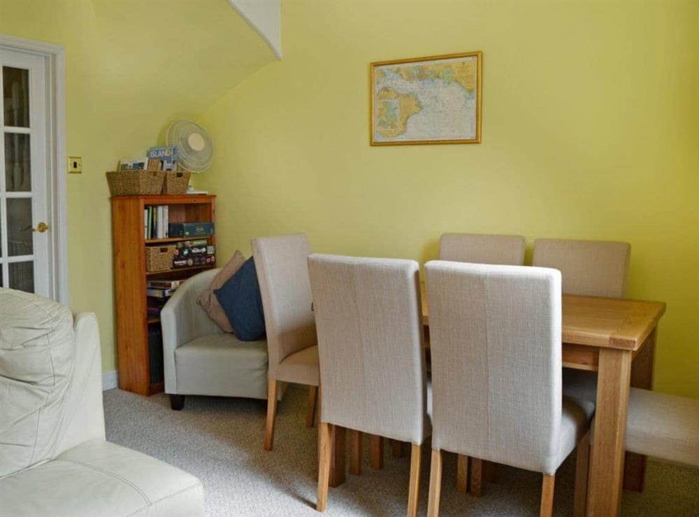 Bright and colourful living/dining room (photo 2) at Culver Cottage in Sandown, Isle Of Wight