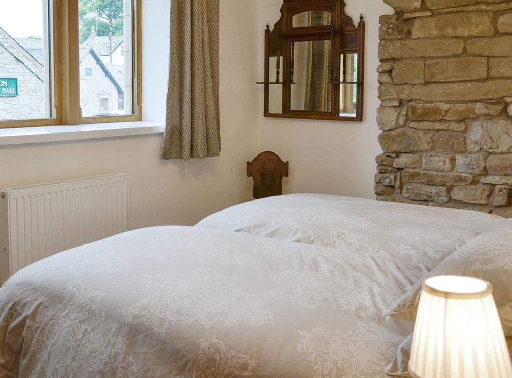 Light and airy twin bedroom at Cumberland House in Orton, near Appleby, Cumbria