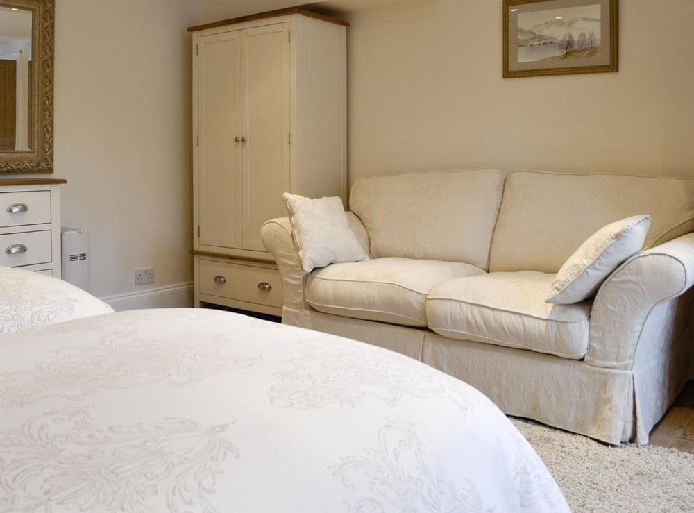 Seating area within twin bedroom at Cumberland House in Orton, near Appleby, Cumbria