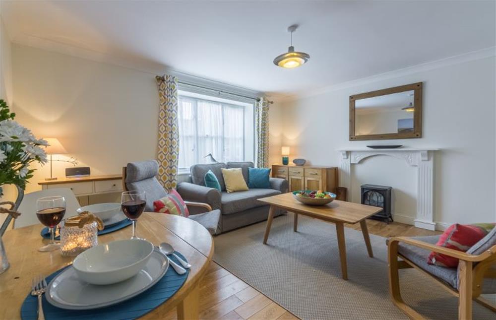 Ground floor: The sitting room also has dining table at Curlew Apartment, Wells-next-the-Sea