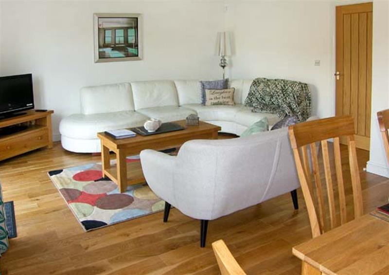 Relax in the living area at Curlew, Milford Haven