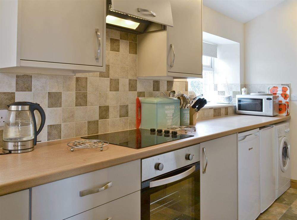 Well-equipped kitchen at Curlew Cottage in Belford, near Bamburgh, Northumberland