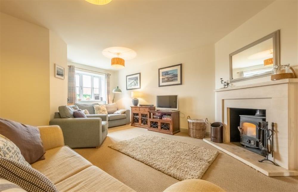 Curlew Cottage: Spacious sitting room with a wood burning stove