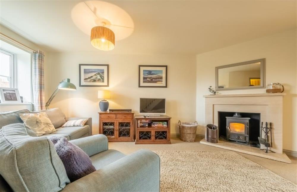 Curlew Cottage: Spacious sitting room with a wood burning stove