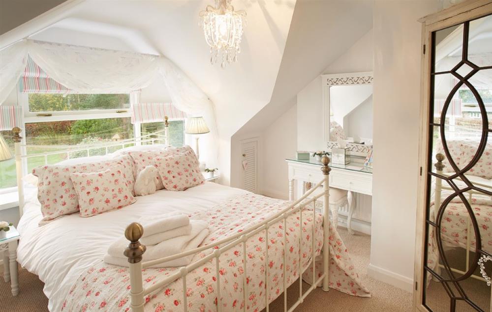 Bedroom with a king-size bed at Curlew Cottage, Lower Peover
