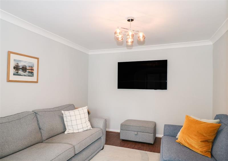 Relax in the living area at Curlew Cottage, Lymington