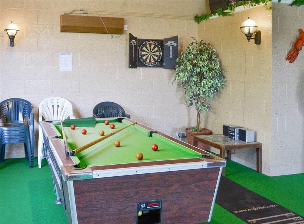 Pool table within the pool-house