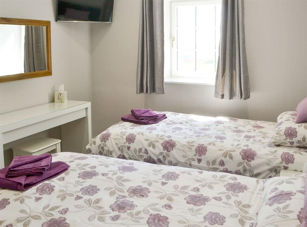 Relaxing twin bedroom at Curlew Cottage in Near Bellingham, Northumberland