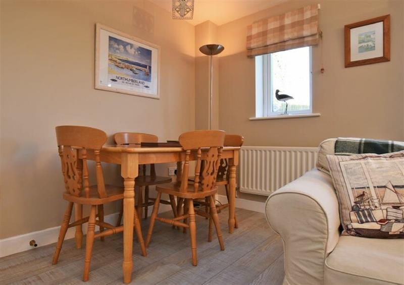 Relax in the living area at Curlew Cottage, Seahouses