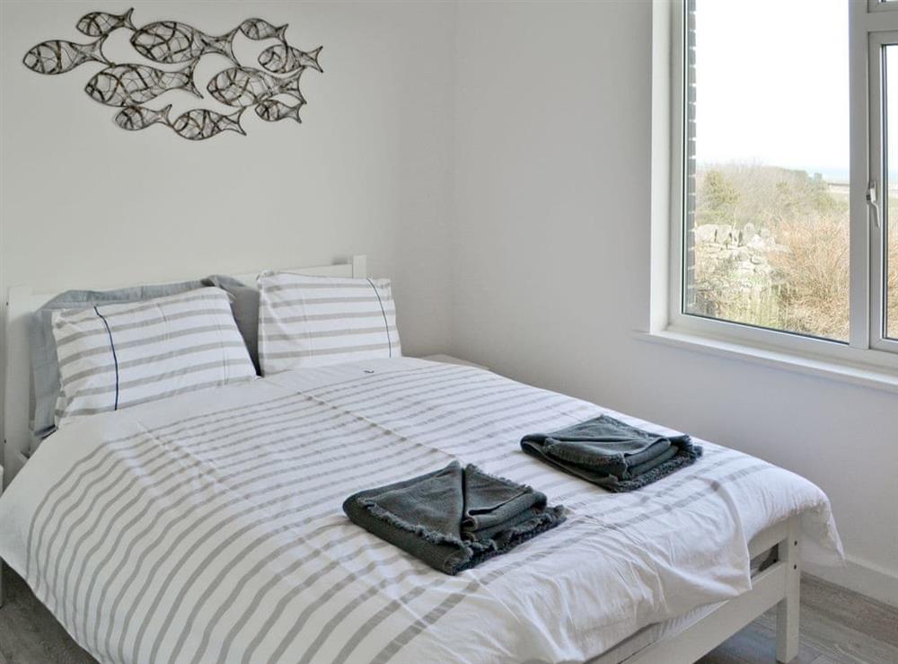 Comfortable double bedroom at Curtain Cottage in Chathill, Northumberland