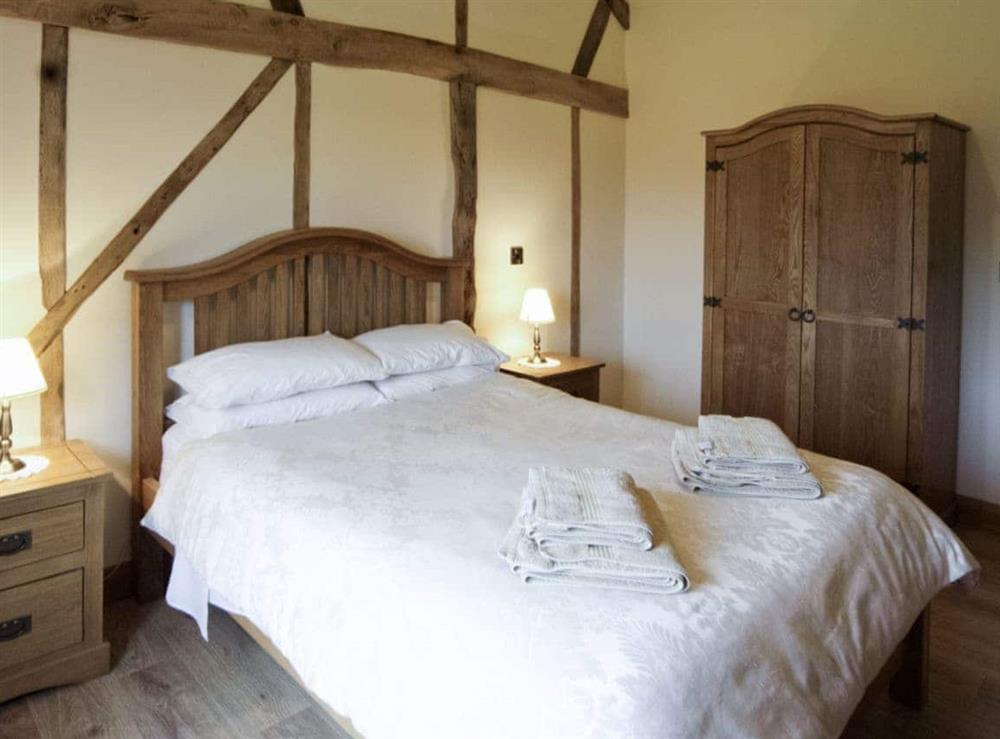 Double bedroom at Cwm Corn Barn in Newtown, Powys
