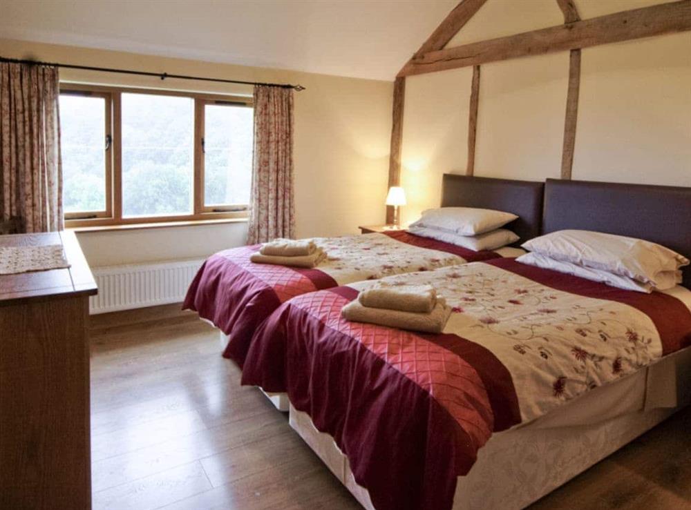 Twin bedroom at Cwm Corn Barn in Newtown, Powys