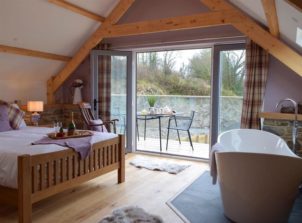 Master bedroom (photo 2) at Cwm Hyfryd in Llanboidy, near Laugharne, Dyfed