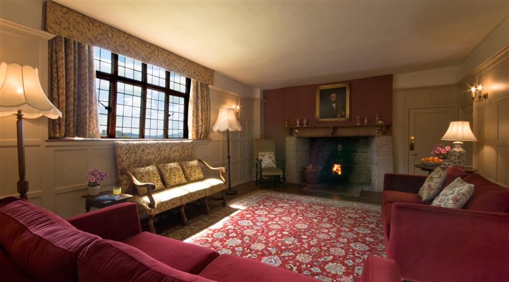 The sitting room at Cwmmau Farmhouse in Whitney-on-wye, Herefordshire