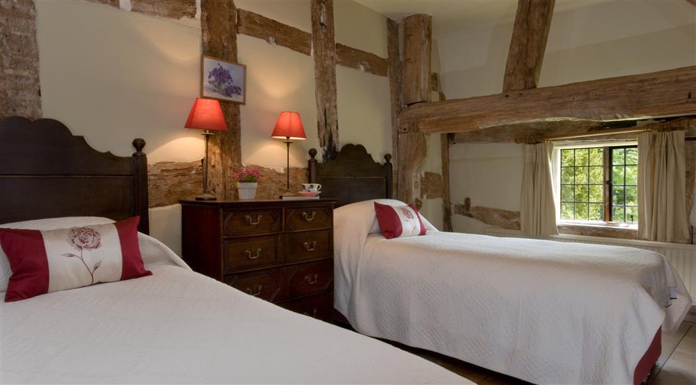The twin bedroom at Cwmmau Farmhouse in Whitney-on-wye, Herefordshire