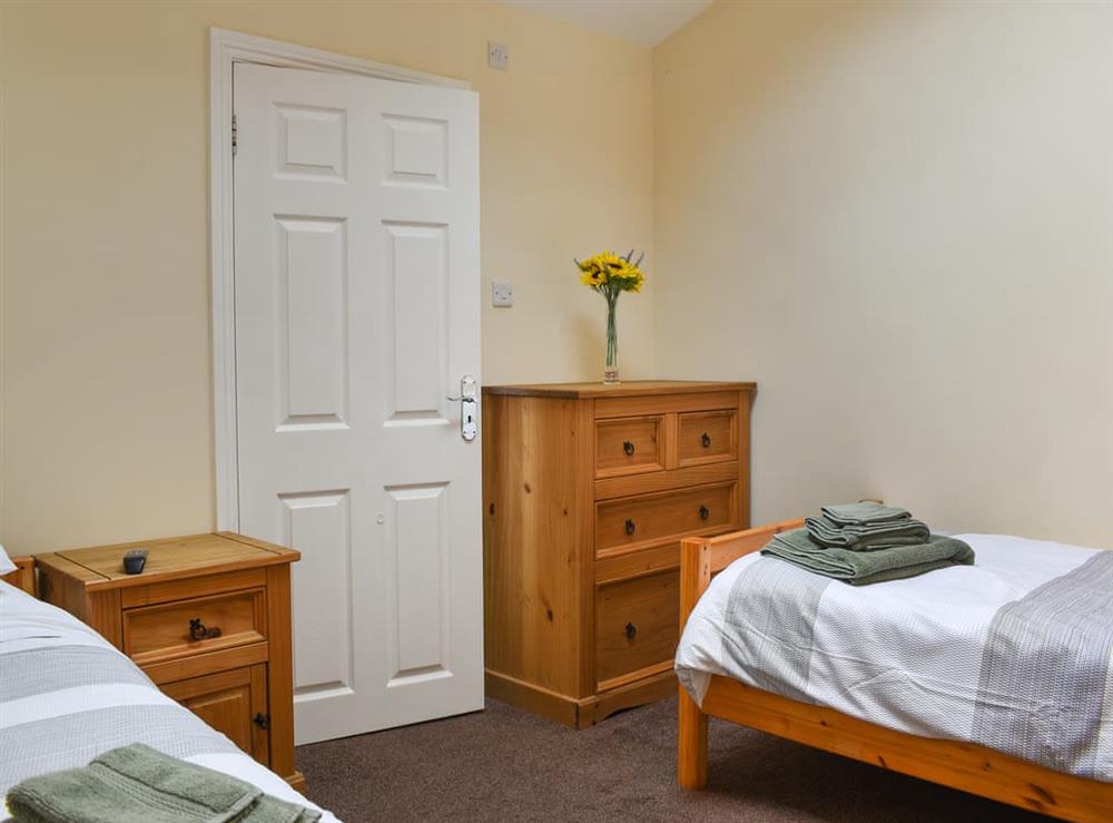 Twin bedroom at Cwtch Corner in New Milton, Hampshire