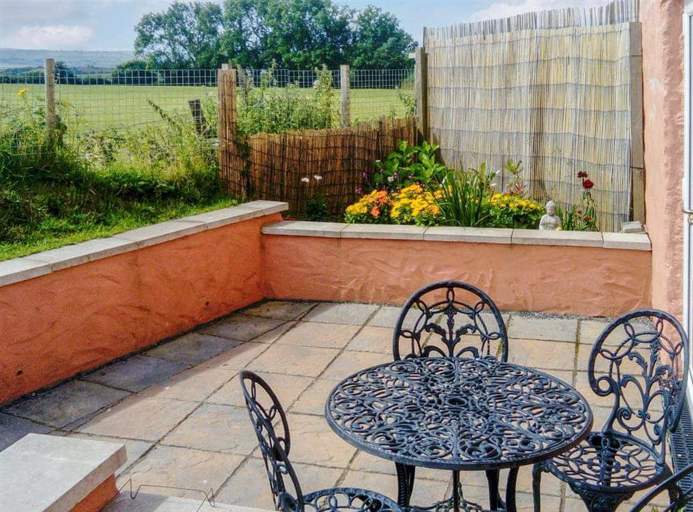Patio at Cwtch Cottage in Henllan, Dyfed