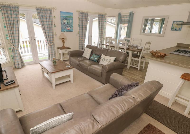 Enjoy the living room at Cwtch Lodge 42, Stepaside near Wisemans Bridge
