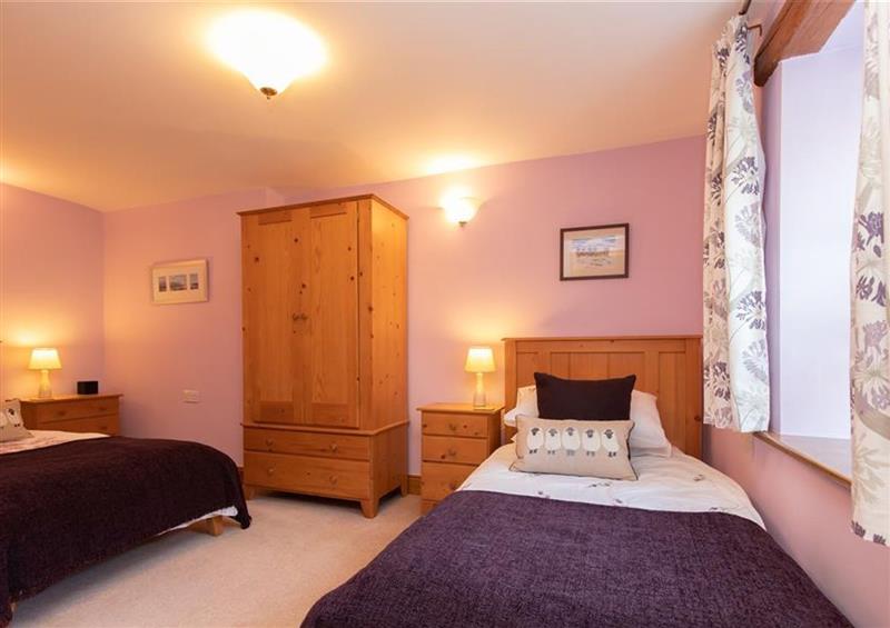 A bedroom in Cygnet Cottage (photo 2) at Cygnet Cottage, Thornthwaite