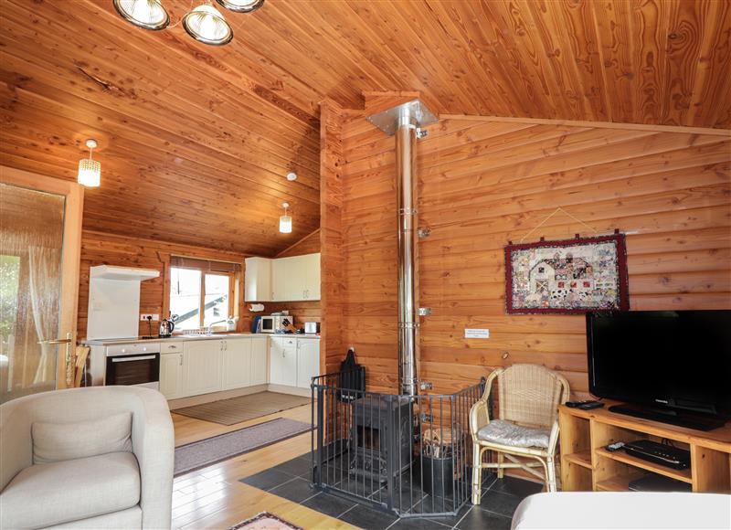 Relax in the living area at Dailfearn Chalet, Achmore near Balmacara