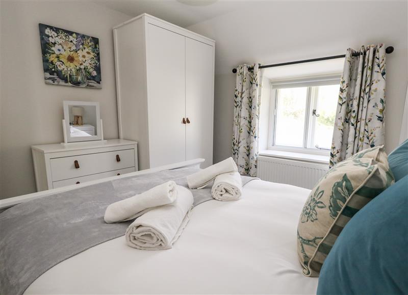 A bedroom in Dairy Cottage at Dairy Cottage, Abbotsbury
