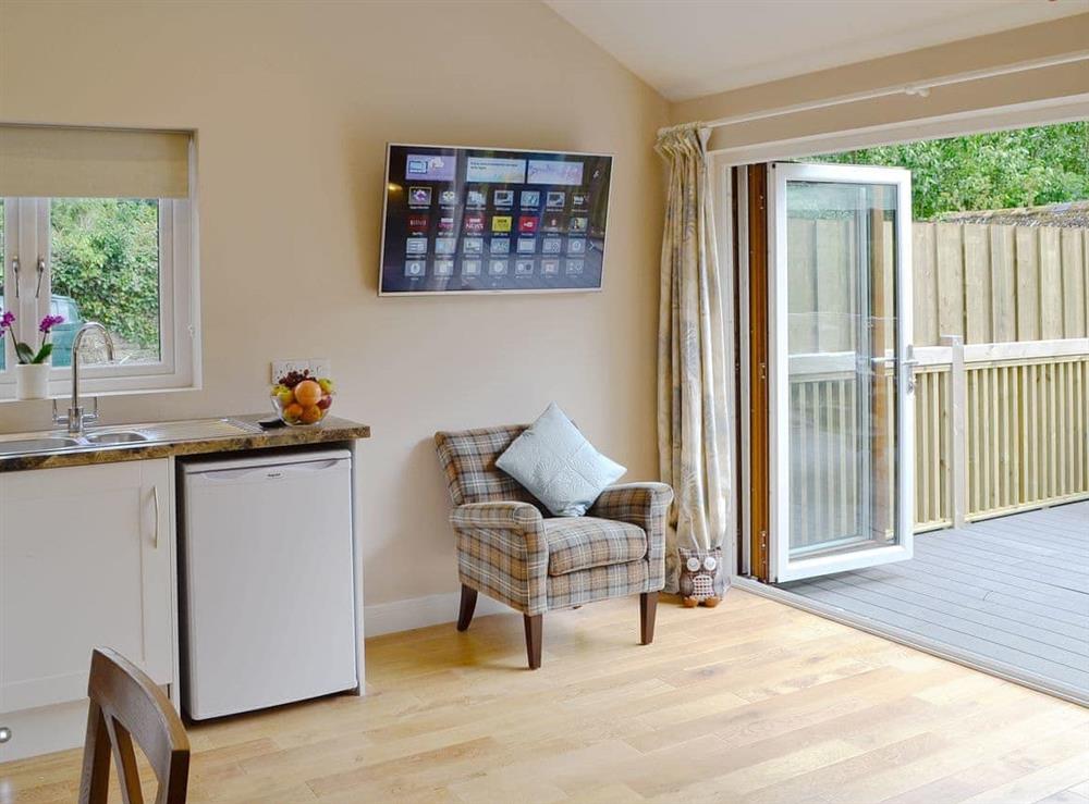 Open plan living/dining room/kitchen (photo 3) at Dairy Cottage in Bodmin, Cornwall