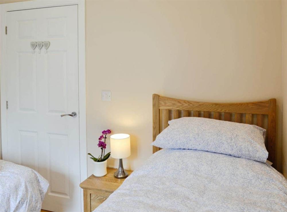 Twin bedroom at Dairy Cottage in Bodmin, Cornwall