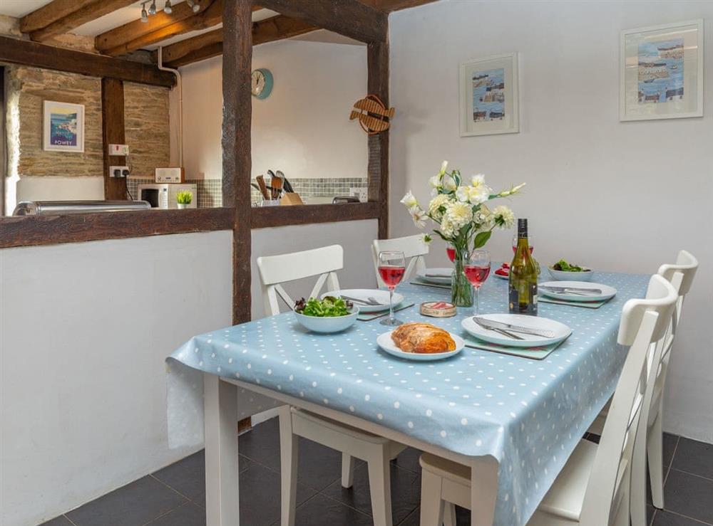 Spacious dining area at Dairy Cottage in Fowey, Cornwall
