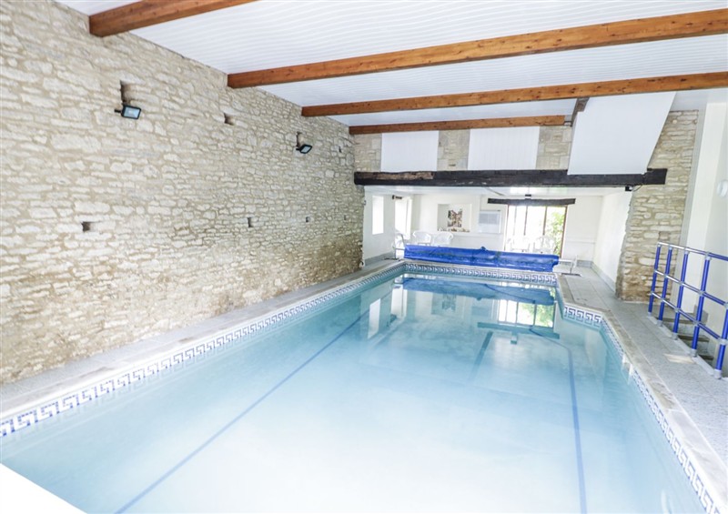 Spend some time in the pool at Dairy Cottage, Minster Lovell