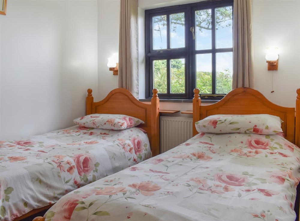 Twin bedroom at Dairy Cottage in Trebell Green, near Bodmin, Cornwall