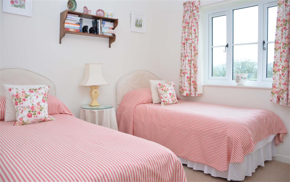 Twin beds in Bedroom 2 at Dairy Cottage in Whitchurch Canonicorum