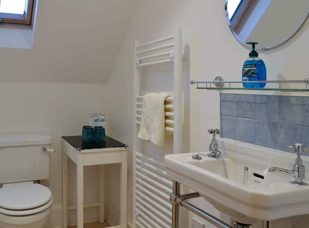 Bathroom with heated towel rail at Dairy Cottage in Whitehouse, near Alford, Aberdeenshire