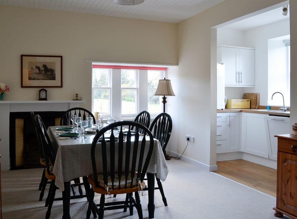 Dining room and adjacent kitchen at Dairy Cottage in Whitehouse, near Alford, Aberdeenshire