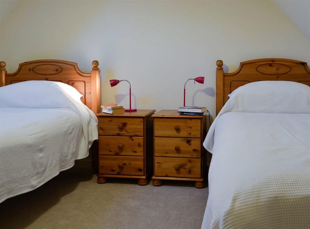 Pretty twin bedroom at Dairy Cottage in Whitehouse, near Alford, Aberdeenshire