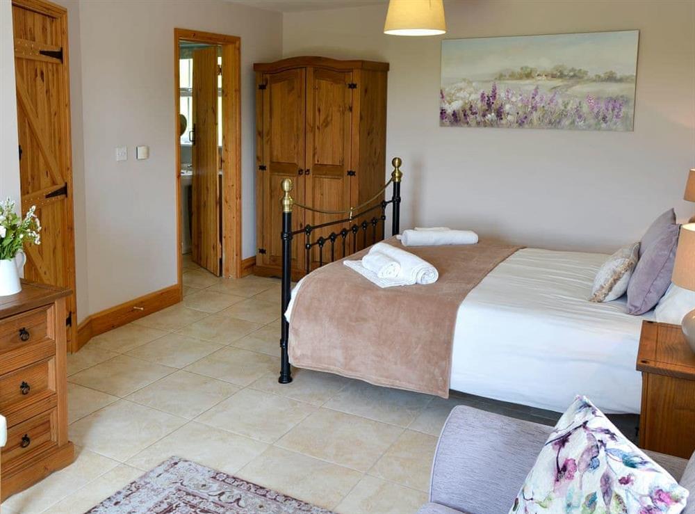 Double bedroom at Dairy Farm Cottage in West Caister, Norfolk