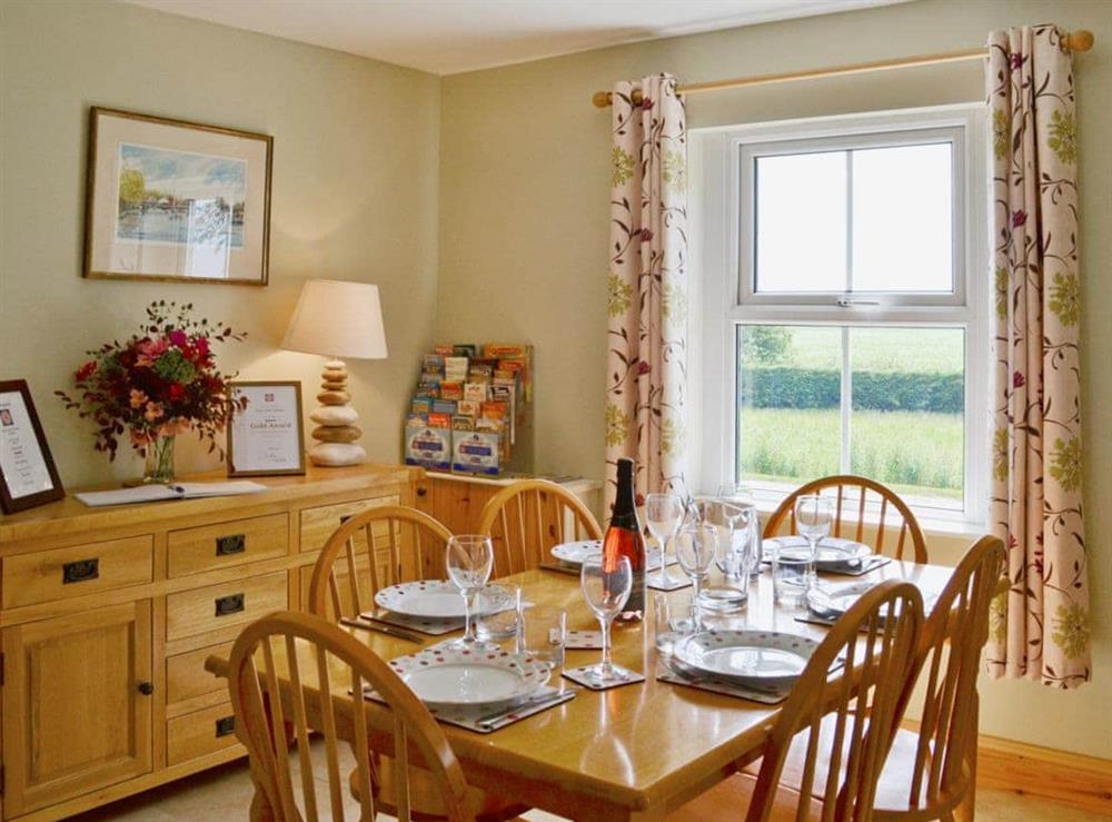 Living room/dining room (photo 4) at Dairy Farm Cottage in West Caister, Norfolk