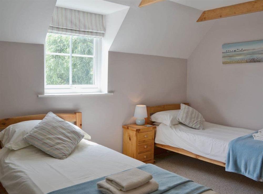 Twin bedroom at Dairy Farm Cottage in West Caister, Norfolk