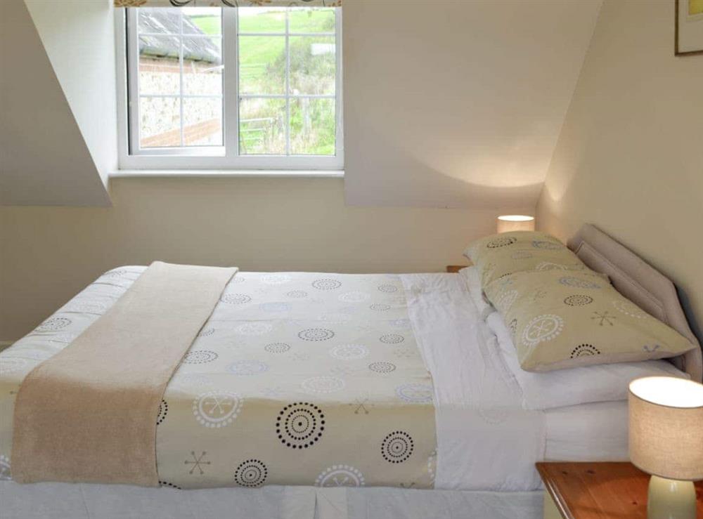 Comfortable double bedroom at Dairy Farm Cottages -Bluebell Cottage in Wootton Fitzpaine, near Charmouth, Dorset