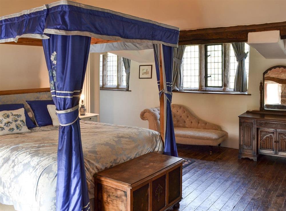 Four poster bedroom at Dairy House Farm in Horton, near Leek, Staffordshire