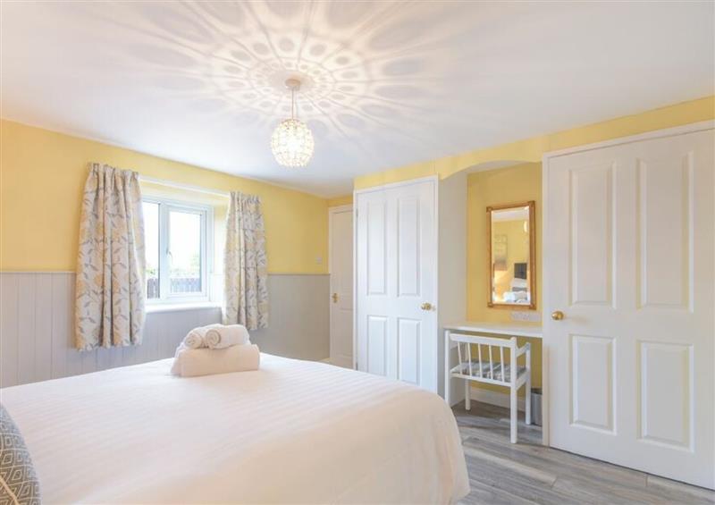 This is the bedroom at Dairymaids Cottage, Amble