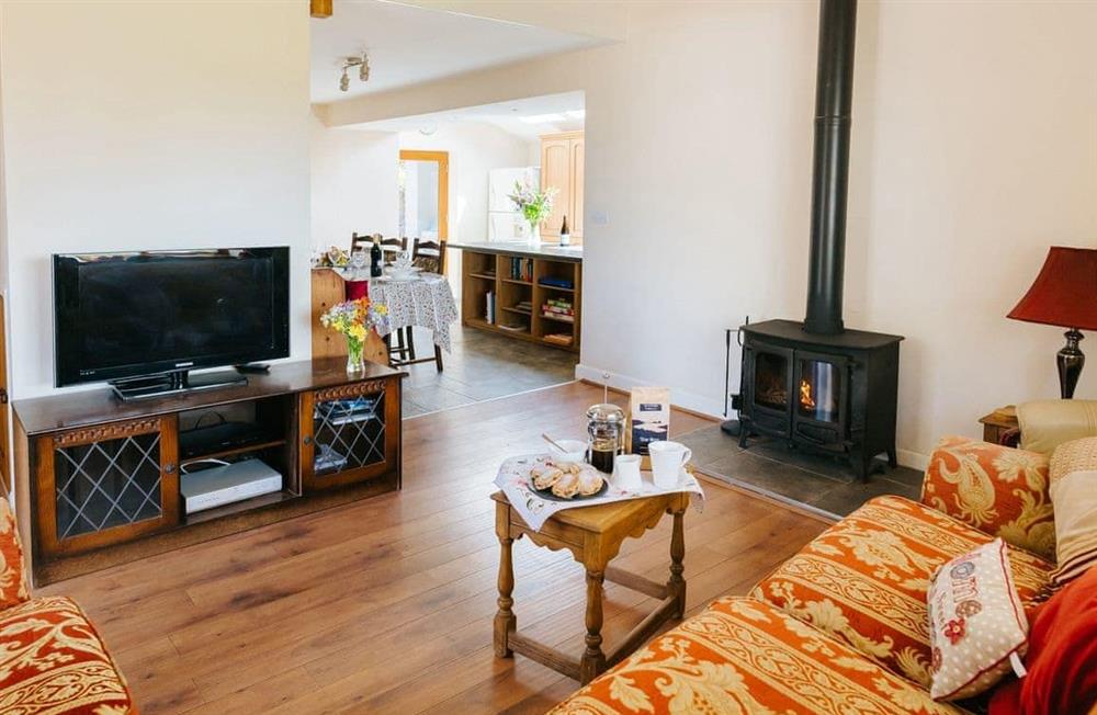 The living area at Dairymaids Cottage in Middleton, near Rhossili, Swansea, West Glamorgan