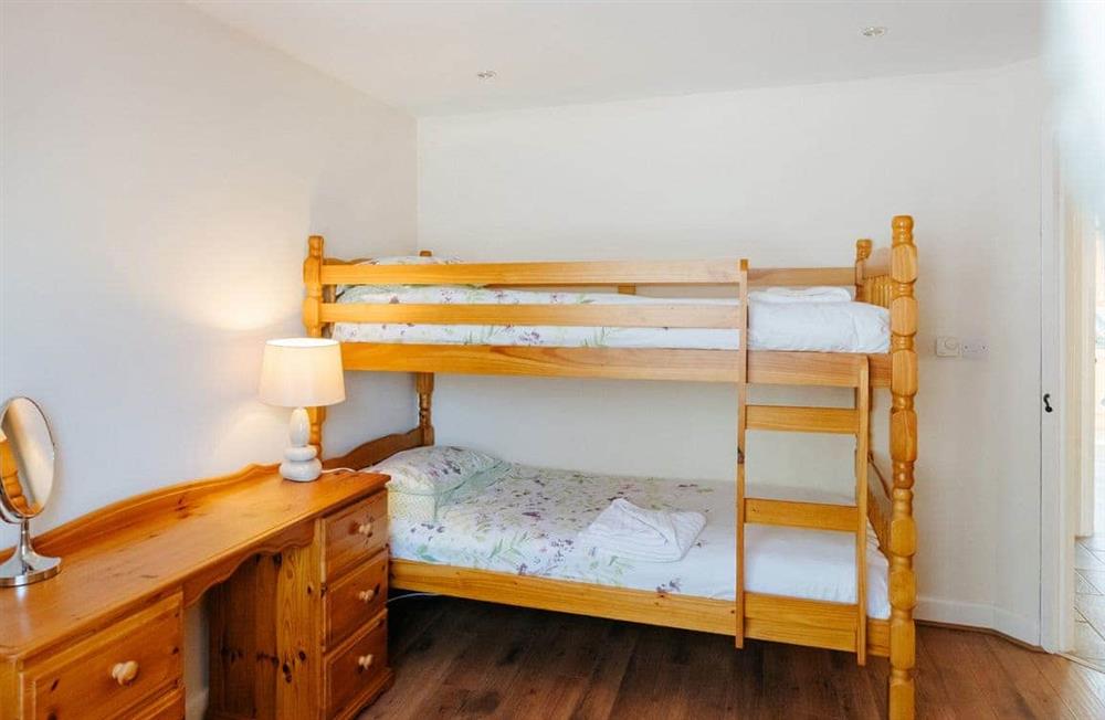 This is a bedroom at Dairymaids Cottage in Middleton, near Rhossili, Swansea, West Glamorgan
