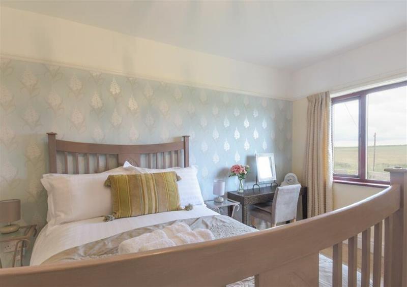 One of the 2 bedrooms at Dairymans Cottage, Amble