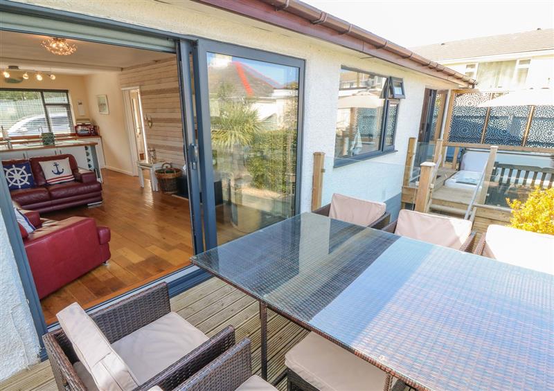 Relax in the living area at Daisy Cottage, Benllech