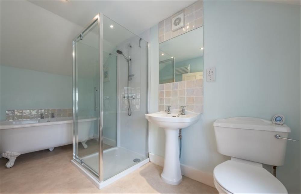 First floor: Bathroom with slipper bath, separate walk-in shower, wash basin, WC and heated towel rail