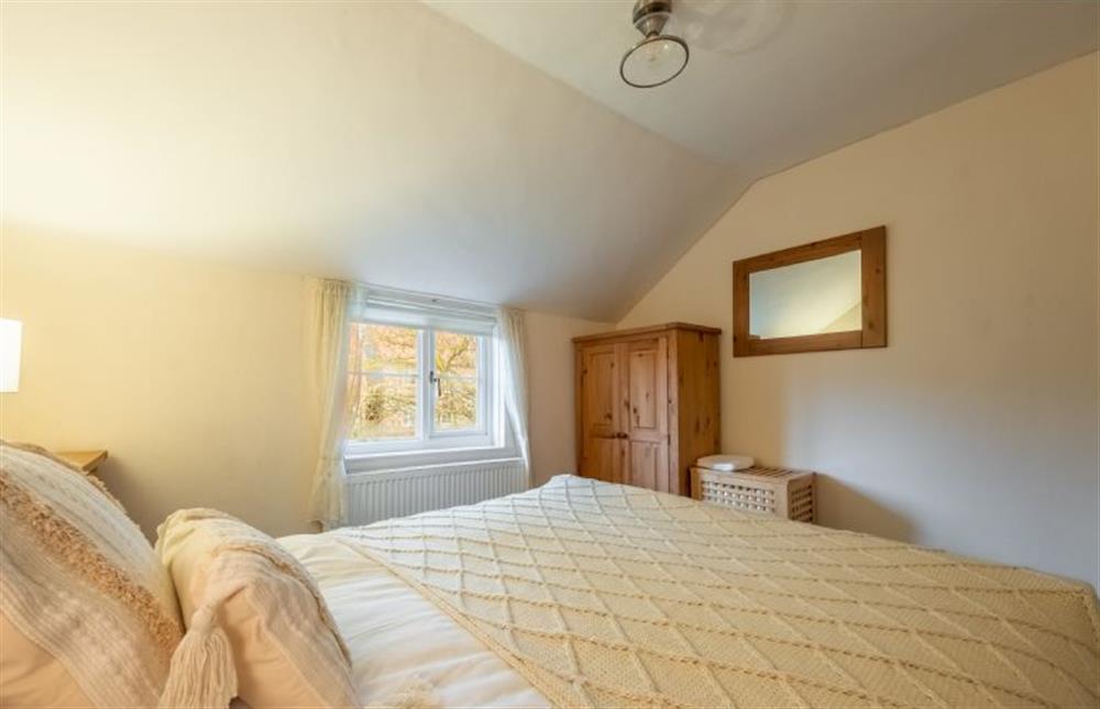 First floor: Master bedroom (photo 2) at Daisy Cottage, Holt