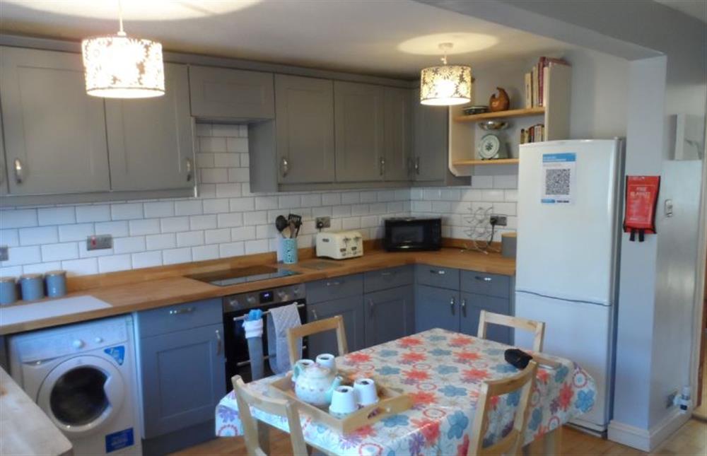 Ground floor:  Well-equipped kitchen and dining area at Daisy Cottage, Northrepp near Cromer