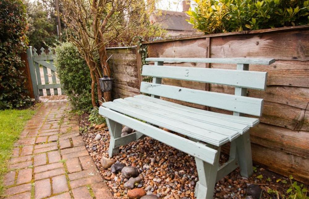 Rear garden with bench at Daisy Cottage, Northrepp near Cromer
